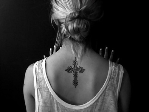Womens flower & celtic cross tattoo on back